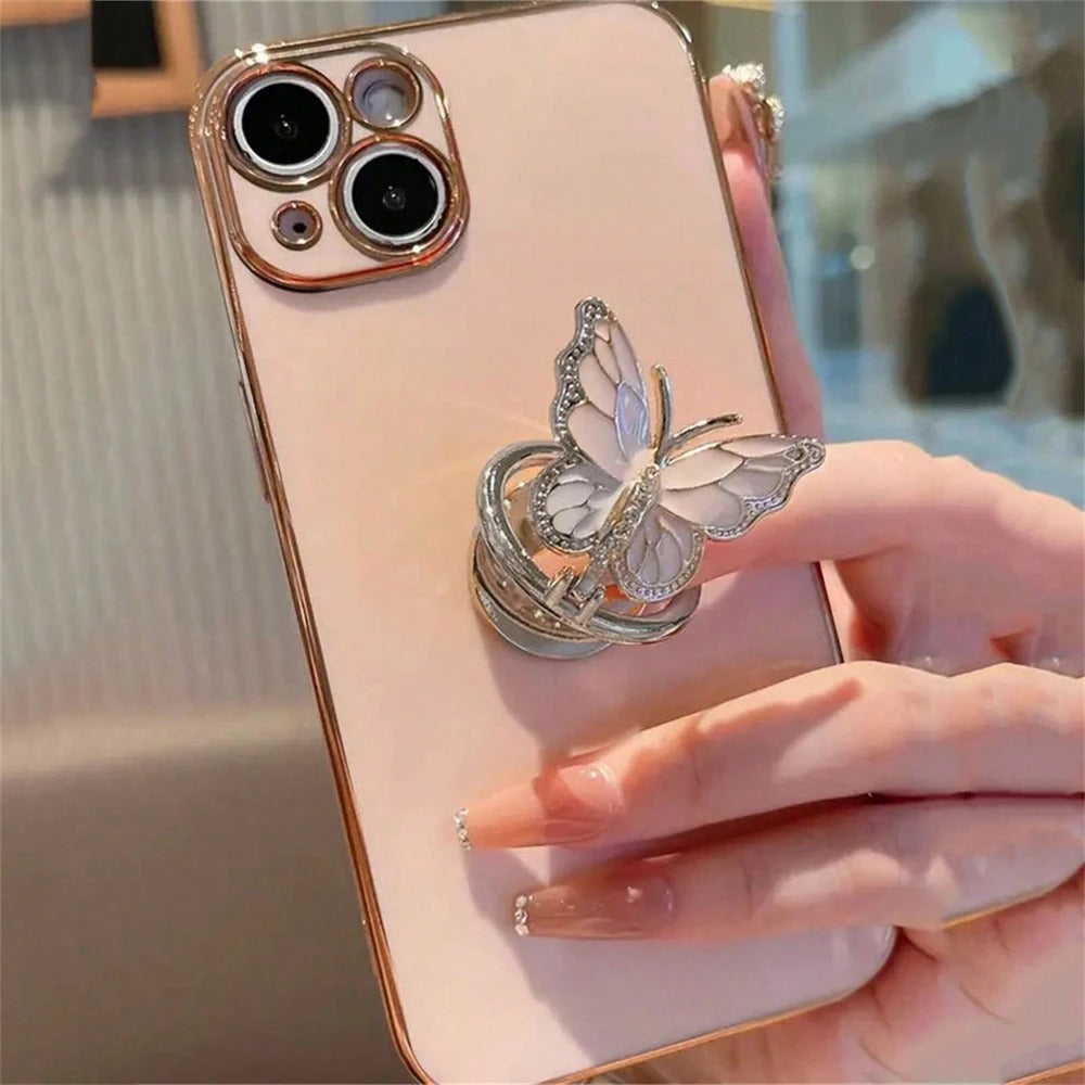 كفر آيفون أنيق بفراشة وخاتم مذهب – قاعدة عرض بتصميم راقٍ